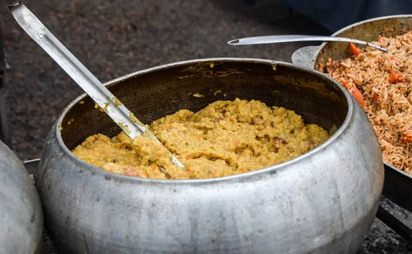 stock image The kulish is an age-old Ukrainian dish popularized by Zaporizhian Cossacks made of millet, salo, potatoes and onions cooked over an open fire