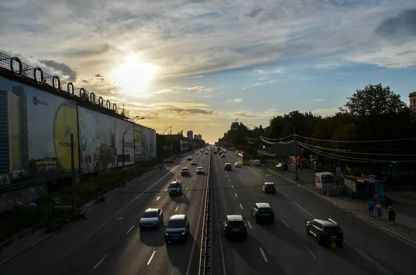 stock image Traffic road with move cars in the evening during off working hours. Roadway asphalt. City landscape