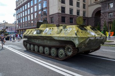 People walk on Kyiv central street Khreshchatyk during exhibition tanks, vehicles and other Russian military equipment destroyed by Ukrainian forces