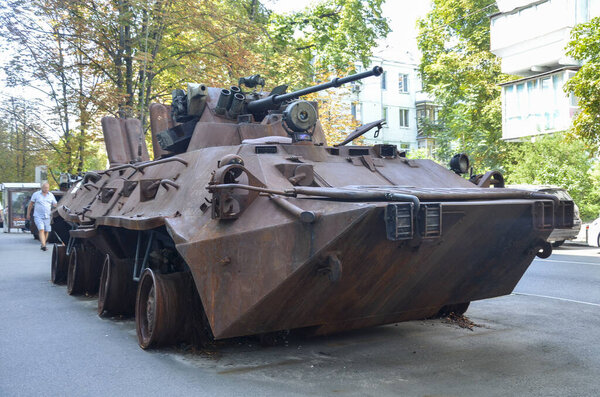 Destroyed and burned russian BTR-82A armored personnel carrier put on a public exposition in Kyiv, Ukraine