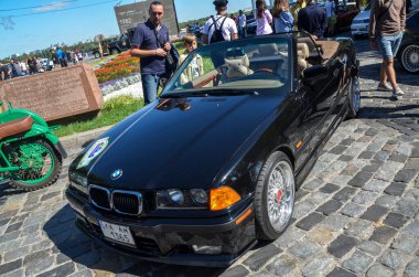 Black compact executive car 1997 BMW E36 328i sport cabriolet is a very smart modern classic produced by the German automaker BMW clipart