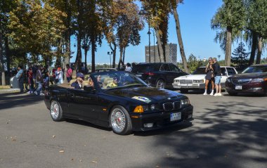 Black compact executive car 1997 BMW E36 328i sport cabriolet is a very smart modern classic produced by the German automaker BMW clipart