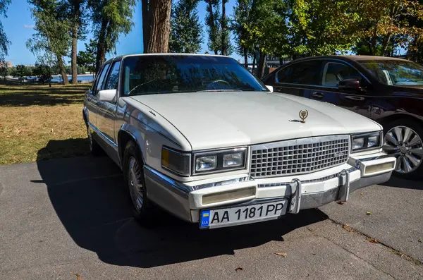 stock image American luxury vintage car white sedan Cadillac DeVille 1990 presented at exhibition of retro cars in Kyiv 