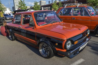 ZAZ 968M, also known as the Zaporozhets, is a compact car  recognized for its distinctive rear-engine design and air-cooled V4 engine clipart