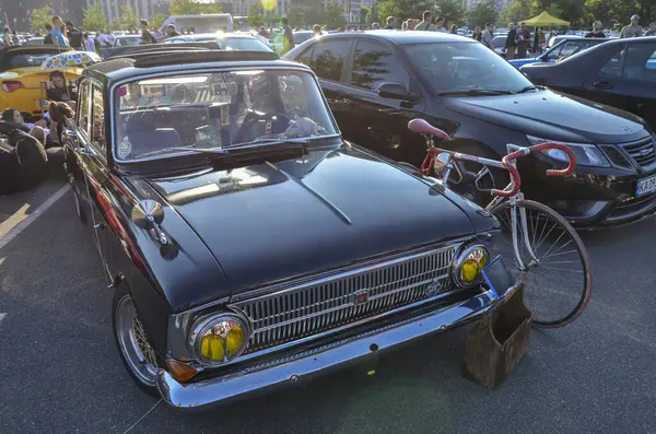 stock image 1990 Moskvitch 412: Soviet-era compact sedan with a 1.5L engine, rear-wheel drive, and robust design. Known for its reliability and simplicity