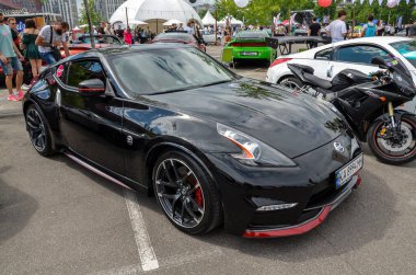 Power elegance modern sports car black 2018 Nissan 370Z features a  stunning exterior that captures attention clipart