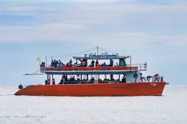 Rayong, Thailand - October, 15, 2022 : Passenger boat floating in the sea at the Koh Samet island, Rayong, Thailand