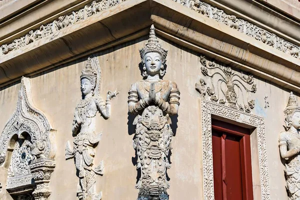 stock image Chiang Mai, Thailand - December, 19, 2022 : Thai white angel statue stucco in Wat Phra Singh , temple in Chiang Mai, Thailand.