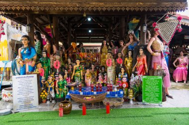 Lop Buri, Thailand - September, 20, 2024 :A Colorful Display of Thai Spirit House Figures at Lop Buri, Thailand. clipart