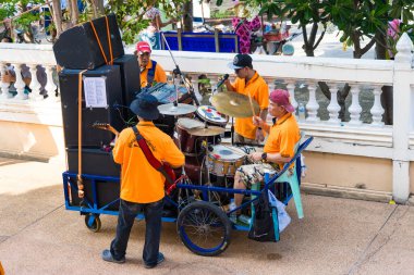 Samut Prakan, Thailand -May, 13, 2024 : Mobile Thai Music Performance Featuring Street Musicians Playing at Samut Prakan, Thailand. clipart