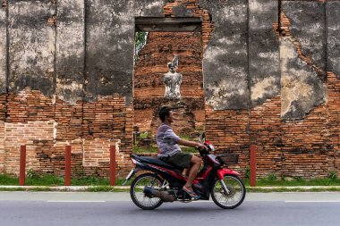 Ayutthaya, Thailand - April, 26, 2024 : Motorcycle Near Historic Site at Ayutthaya, Thailand. clipart