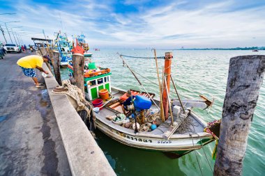 Chonburi, Thailand - November, 18, 2024 : Colorful Fishing Boats Docked at a Bustling Harbor in Thailand, Showcasing Traditional Maritime Culture and Vibrant Coastal Life at Chonburi, Thailand. clipart