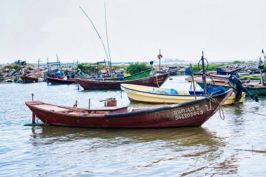 Chonburi, Thailand - November, 18, 2024 : Rustic Fishing Vessel in Tranquil Sea at Chonburi, Thailand. clipart