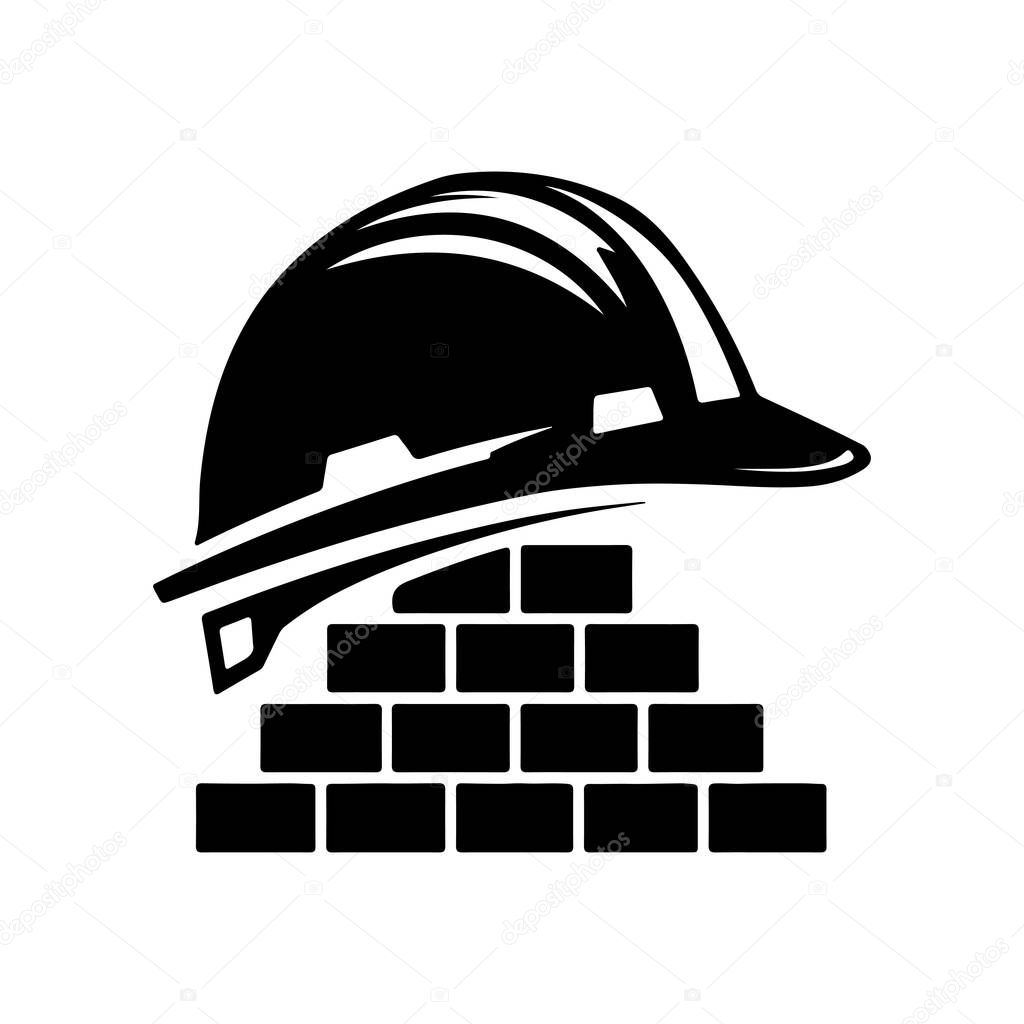 Construction Helmet and Bricks: Safety First Building Image