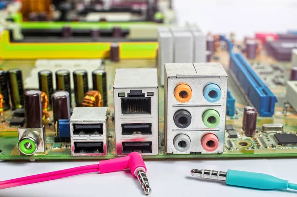 audio sound outputs of motherboard and male connector close-up
