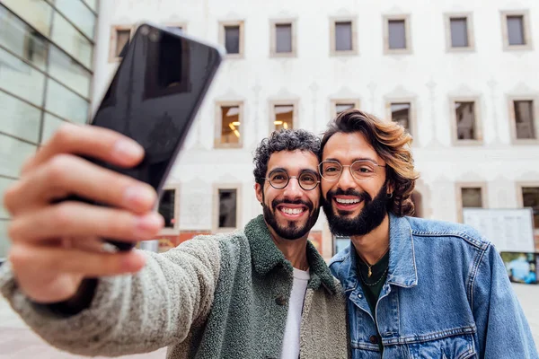 Happy Couple Gay Men Laughing Taking Selfie Photo Mobile Phone — Φωτογραφία Αρχείου