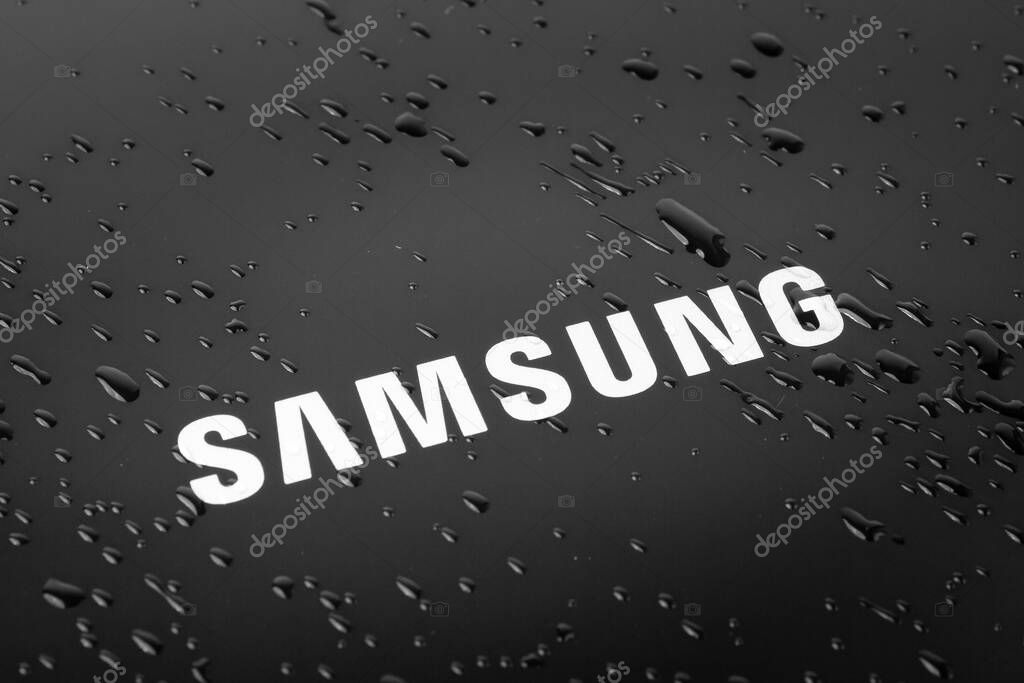 UKRAINE, DNEPR - JUNE 10, 2023: Samsung company logotype. Samsung inscription on the device. High quality photo