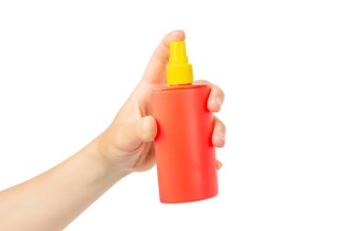Beyaz arka planda izole edilmiş turuncu plastik sprey şişesi. Yüksek kalite fotoğraf