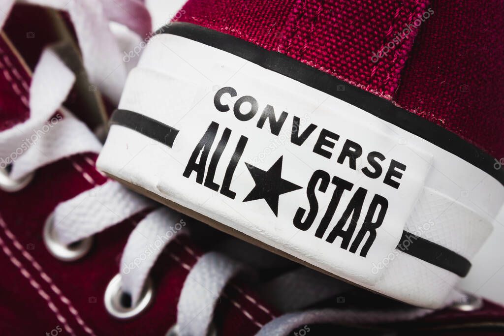 UKRAINE, DNEPR - JUNE 23, 2023: Classic Converse logo on sneakers. High quality photo