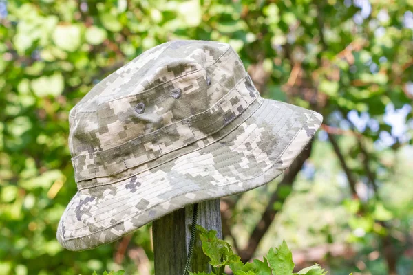 Bucket hat in camouflage coloring. Irish country hat. High quality photo