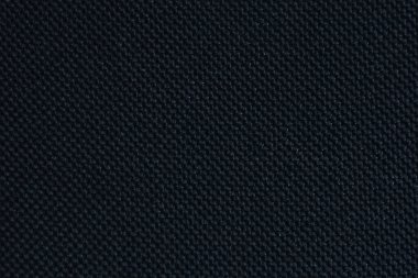 Koyu dokulu kumaş yüzeyine yakın çekim. Çoklu amaçlar için çok yönlü resim