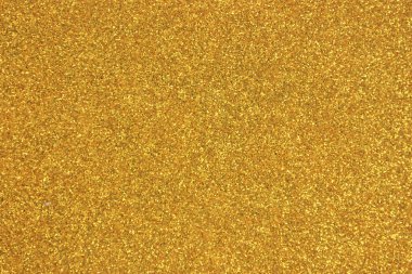 Işıldayan altın parıltılı bir arkaplan. Yaratıcı ve ticari kullanım için ideal