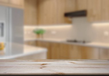 Mutfak arka planında bulanıklık olan boş ahşap masa. ürün gösterimi için