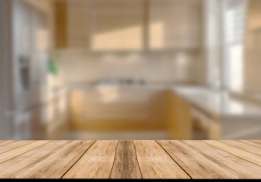 Mutfak arka planında bulanıklık olan boş ahşap masa. ürün gösterimi için