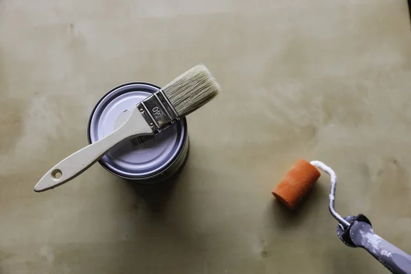 Paint set with paint can, brush and roller. Copyspace