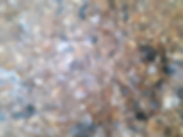 背景には岩肌の青みがかった質感があり 写真面の石はタイのラノンにある — ストック写真