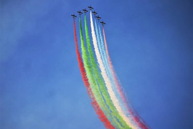 The most spectacular formation manoeuvre of aerobatics, Dubai Air Show. clipart