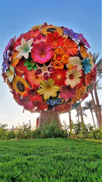 A beautiful \'The World Flower Tree\' , a symbol of the relationship between the man-made world and nature, Dubai Harbour Creek.