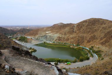 Vadi Shawka manzarası (güçlü vadi / vaha), Birleşik Arap Emirlikleri 'ndeki Ras Al Khaimah' ın Hajar Dağları 'nda yer almaktadır..