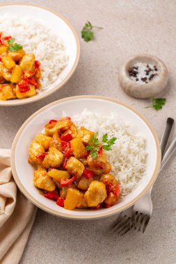 Turkey curry cooked with bell peppers and pineapple.  Basmati rice.