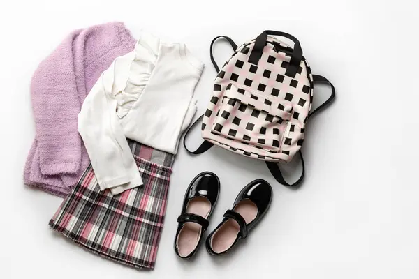 Girls School Clothes White Blouse Pink Cardigan Plaid Skirt Black — Stock Photo, Image