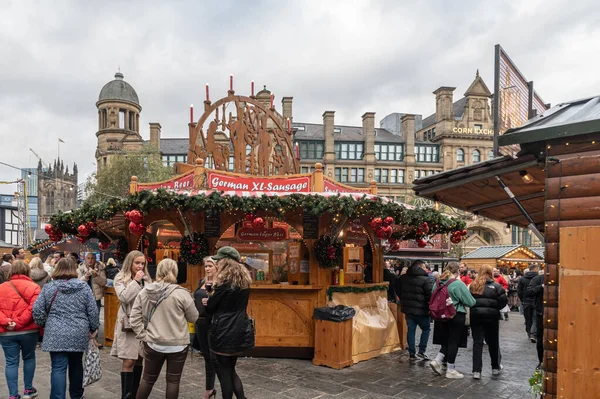 stock image Manchester, England - 11 November 2022: Extremely busy crowds during Christmas Market 2022 ner stalls during openings in Manchester, UK