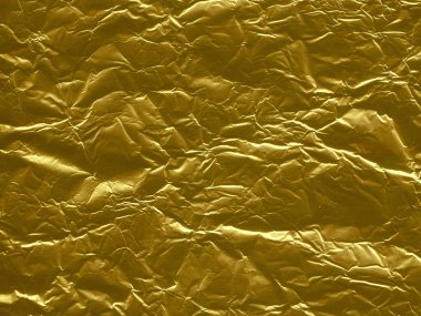 Fotoğraf, tasarım ya da grafik için arka plan. Bu kaliteli altın arka plan sana profesyonel bir görünüm verecek.