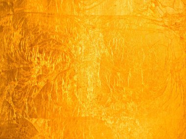 Fotoğraf, tasarım ya da grafik için arka plan. Bu kaliteli altın arka plan sana profesyonel bir görünüm verecek.