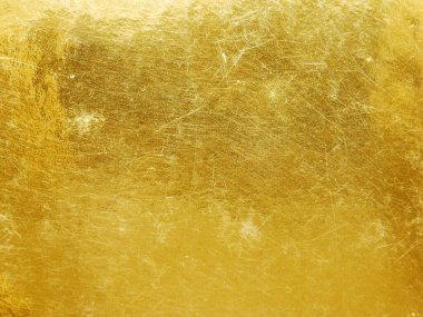 Fotoğraf, tasarım ya da grafik için arka plan. Bu kaliteli altın arka plan sana profesyonel bir görünüm verecek.