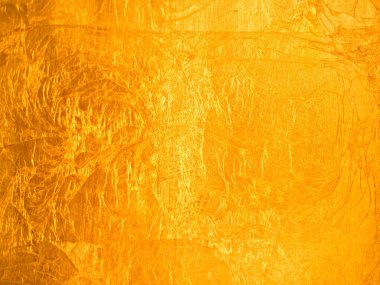 Fotoğraf, tasarım ya da grafik için arka plan. Bu kaliteli altın arka plan sana profesyonel bir görünüm verecek.