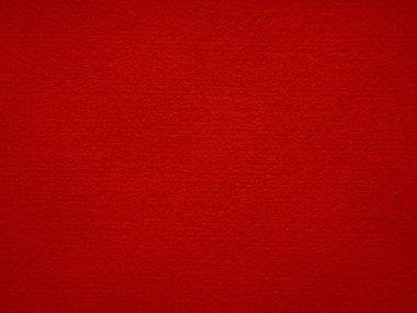 Kırmızı keçeli kumaş yakın çekim. Noel masaüstü, tatil yeni yılı, xmas mevsimsel dekorasyonu, valentin günü, harf, metin, yama işi, parti selamlaması ve düğün kartı elementi için doymuş bir arkaplan.