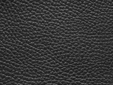 Hakiki lüks siyah deri doku örneği. Fotokopi alanı ve üst görünümü olan arkaplan. Koyu tonda deri deseni. Sahte eko deri. Tasarım, döşenmiş mobilya ve giysi için arka plan desenli efekt