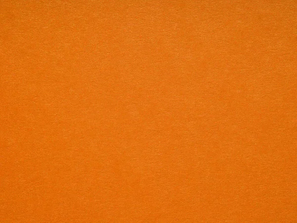 空白のオレンジ色の紙の段ボールページのテクスチャ 冬の祭りのカード パッチワーク 新年の装飾 背景の概念 テキスト レタリング 壁のスクリーンセーバーや他の芸術作品のための効果 — ストック写真