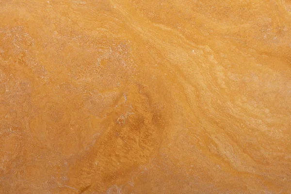 stock image Travertine Yellow, background, texture in warm color, photo of slab. Orange or soft brown stone material backdrop for exterior home decoration, 3d, floor tiles and ceramic wall tiles surface.