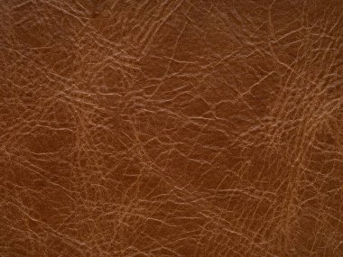 Orijinal yumuşak kahverengi deri cilt doğal tasarım çizgileri desenli ya da kırmızı soyut arkaplan. Hakiki deri dokusu. Duvar kağıdı veya arkaplan lüks etkinliği kullanın, döşenmiş mobilya, giysi tasarımları