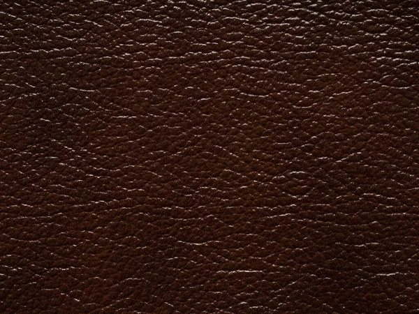 Luxury Dark brown leather, skin natural with design lines pattern or red abstract background. Can use wallpaper, backdrop luxury event, design upholstered furniture, clothing. Genuine leather texture