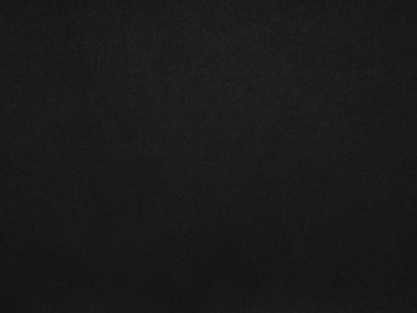 Matte black paper texture, abstract background. The name of the color is burgundy. Blank page sheet decor. Background for handcrafts, new year designs decoration, text, lettering, wall screen saver