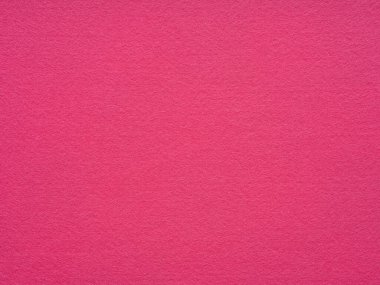 Magenta, hot pink felt texture close-up. Handicraft concept, patchwork, designs decoration, background concepts, text, lettering or art work. Surface of felted material texture, abstract backdrop