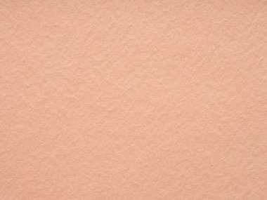 Powder beige felt velvet texture. Surface of felted soft background for text, lettering, patchwork, 3d or other art work. Full frame vintage backdrop pattern wallpaper of art and stationery material.