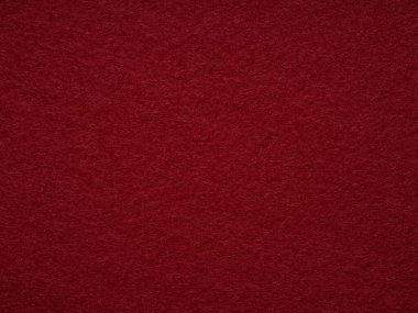 Dark red blank felt texture closeup. Full frame retro, vintage pattern. Top view, layout, place for text. Textured wool pattern for shops with goods, creativity to illustrate patchwork master classes